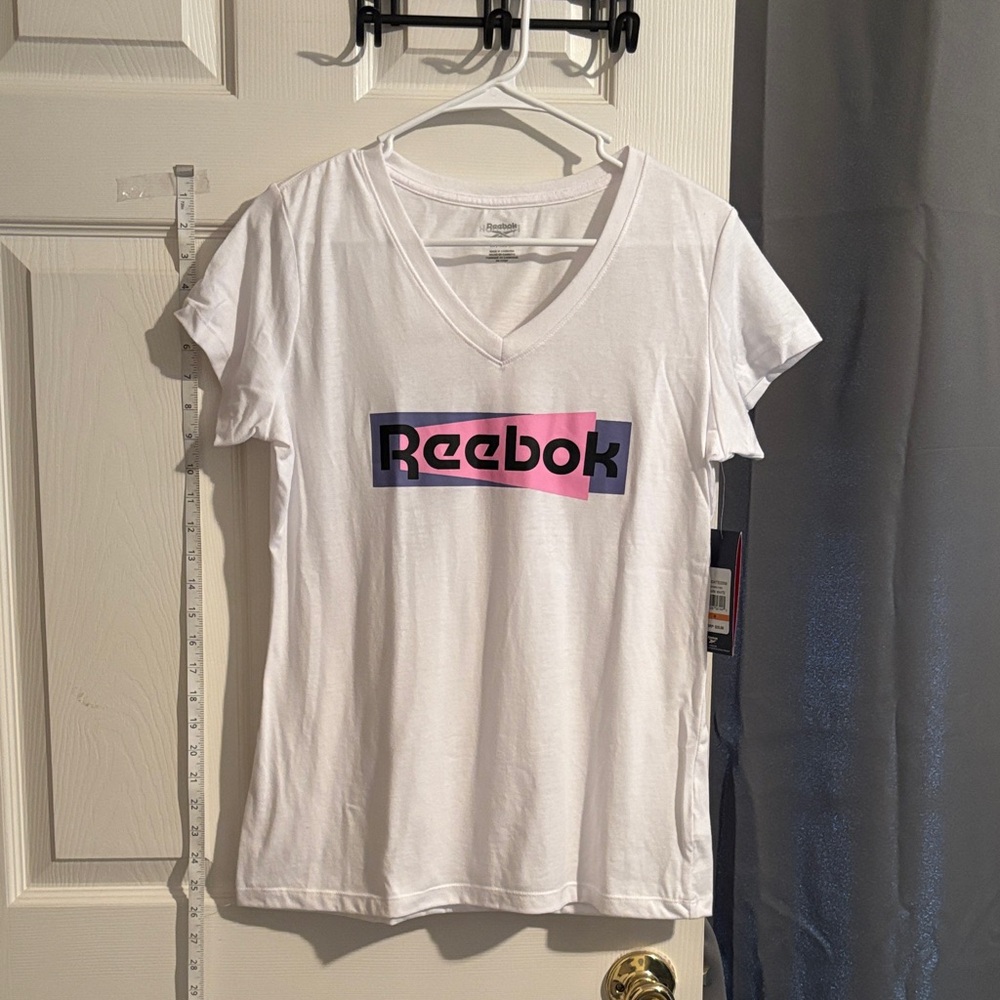 Reebok White V Neck Tee with Pink, Purple, and Black Logo